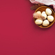 Easter background with eggs and napkin on dark red backround. - PhotoDune Item for Sale