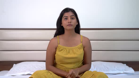 Indian influencer talking to the camera alt