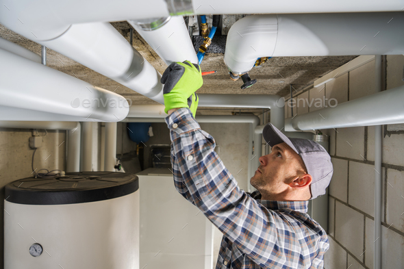 Plumbing Contractor Finishing Sanitary Pipeline Installation - Stock Photo - Images