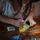 Pasting gemstones, a little girl is making artwork with her own hands. - PhotoDune Item for Sale