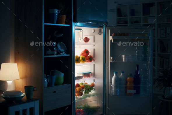 Open fridge in the kitchen Stock Photo by stockasso