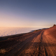 Dirt road in mountains above clouds - PhotoDune Item for Sale