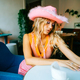 Portrait of attractive caucasian woman fashion model with blonde hair in pink cowboys hat , posing - PhotoDune Item for Sale