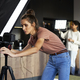 Two female women checking camera and lights before recording - PhotoDune Item for Sale