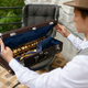 Young musician opening case with saxophone before performance - PhotoDune Item for Sale