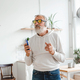 Happy senior man dancing while listening to music with headphones - active old people and enjoyment - PhotoDune Item for Sale