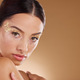 Gold makeup, woman and beauty portrait with model ready for cosmetic, wellness and spa. Brown backg - PhotoDune Item for Sale