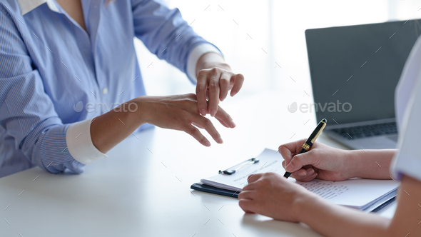 The doctor is examining the patient's illness, explaining the patient's disease effects - Stock Photo - Images