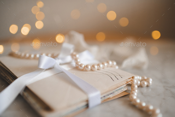 Paper vintage letters with envelope with pearls