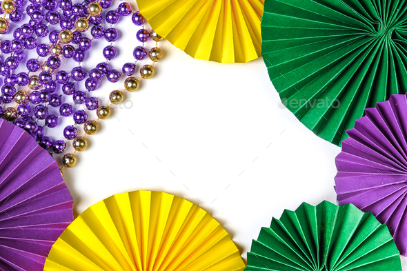 Mardi gras.Holidays mardi gras masquarade, venetian mask fan over purple background. view above,mard - Stock Photo - Images