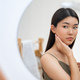 woman looking at mirror - PhotoDune Item for Sale