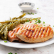 Chicken fillet cooked on a grill and garnish of rice, green beans. - PhotoDune Item for Sale