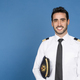 Portrait of an airplane pilot standing proud wearing uniform - PhotoDune Item for Sale