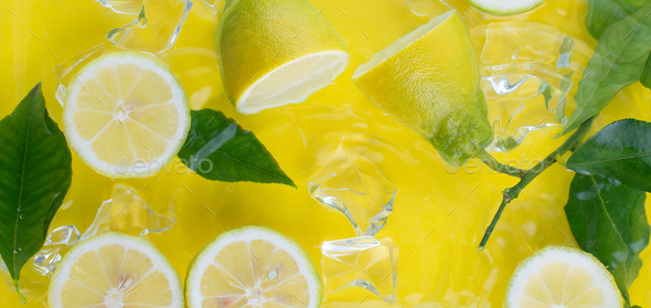 fresh sliced lemons in water for refreshing drink - Stock Photo - Images