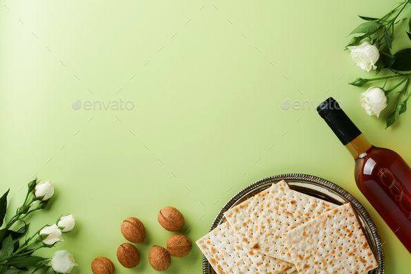 Passover celebration concept. Matzah, red kosher wine, walnut and ...