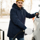 Man refueling his american SUV car at the gas station in cold weather. - PhotoDune Item for Sale