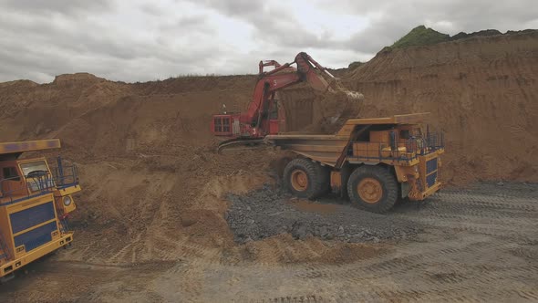 Aerial Shoot Excavator Bucket Digs Coal