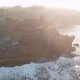 The sun dazzles the drone pickup over a Temple in Bali Indonesia - VideoHive Item for Sale