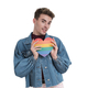 Young caucasian man smiling at camera with lgbt flag heart, isolated. - PhotoDune Item for Sale