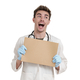 Young caucasian male happy doctor hold a board, isolated. - PhotoDune Item for Sale