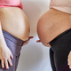 Two pregnant women bellies together. Women sorority concept - PhotoDune Item for Sale