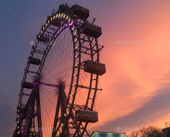shot of the Giant Ferris Wheel in Vienna, Austria,  on a sunset - Stock Photo - Images
