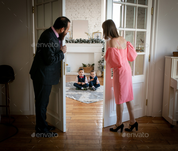 Loving parents look after their boys - Stock Photo - Images