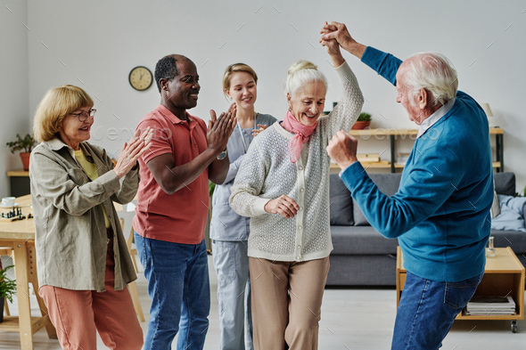 Group of senior people dancing together - Stock Photo - Images