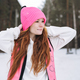 Young red haired woman in pink sportswear running in winter snowy forest - PhotoDune Item for Sale
