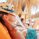 Woman relaxes on vacation in kenya at the beach - PhotoDune Item for Sale