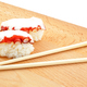 sushi with octopus and wood chopsticks - PhotoDune Item for Sale
