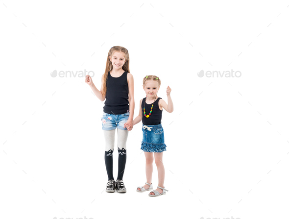 Two sisters play games - a Royalty Free Stock Photo from Photocase