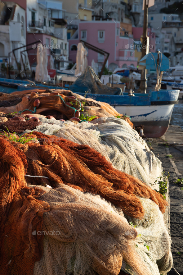 Colorful fishing nets on Marina Corricella on Procida Island, Bay of Naples, Italy. - Stock Photo - Images