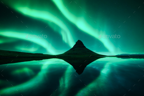 Aurora borealis Northern lights over Kirkjufell mountain - Stock Photo - Images