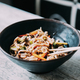 View osf asian noodles udon with pork close-up in a bowl on the table - PhotoDune Item for Sale