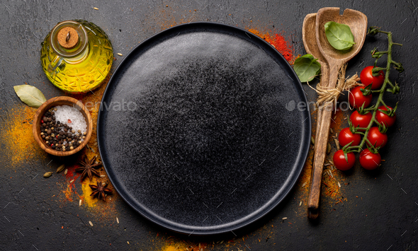 Empty plate and various spices - Stock Photo - Images