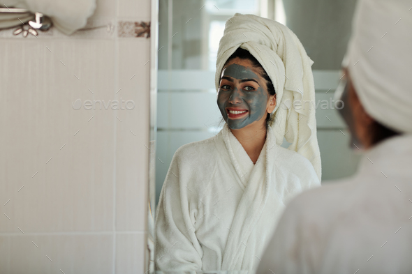 Woman with Charcoal Mask on Face - Stock Photo - Images