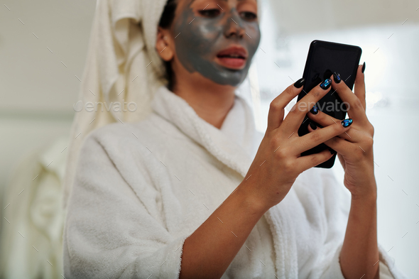 Woman Texting after Shower - Stock Photo - Images