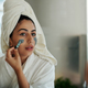 Woman Applying Clay Mask on Face - PhotoDune Item for Sale