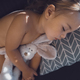 Pretty baby hugs bunny and sleeping - PhotoDune Item for Sale
