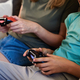 Boy and woman playing video game at home - PhotoDune Item for Sale