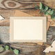 Blank paper and envelope on wooden background with eucalyptus twigs, flat lay. - PhotoDune Item for Sale