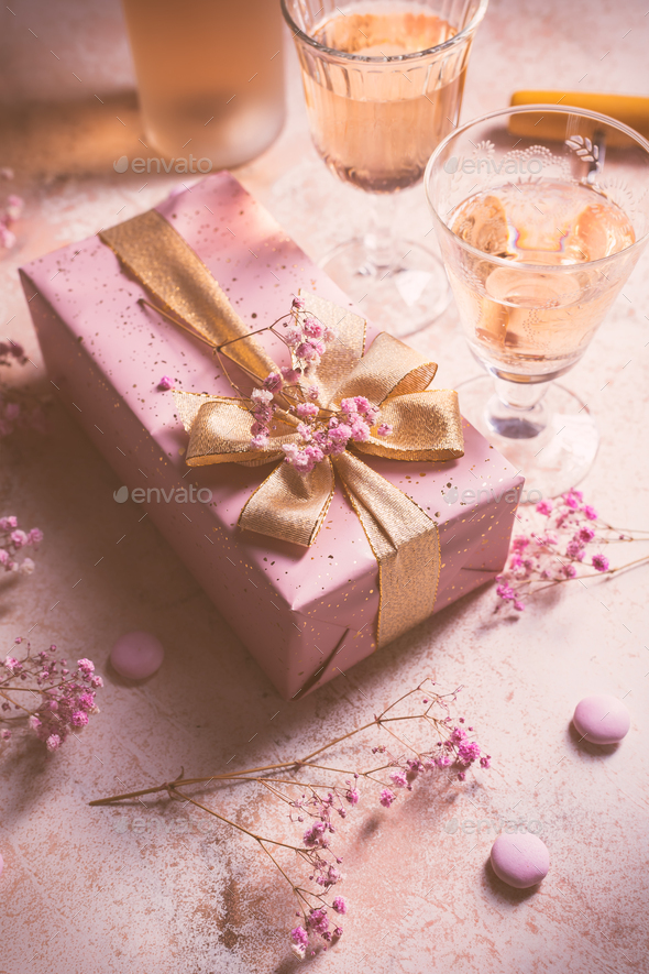 Rose sparkling wine, french macarons and box of chocolates for Valentime, mothers day or birthday - Stock Photo - Images