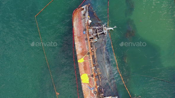 Aerial top view of broken rusty oil tanker ship in the shallow water. - Stock Photo - Images