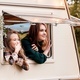 Children,family,brother sister traveling in camper,house on wheels. Trailer motor home.Looking in  - PhotoDune Item for Sale