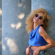Young Brazilian woman with sunglasses laughing. - PhotoDune Item for Sale