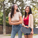 two young women laughing happy and smiling - PhotoDune Item for Sale