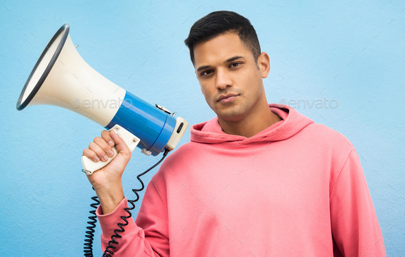 Man, portrait or megaphone for protest, human rights equality or freedom campaign on isolated blue