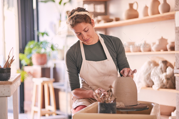 Creative, pottery and design with hands of woman in workshop studio for  molding, ceramics and art. Stock Photo by YuriArcursPeopleimages