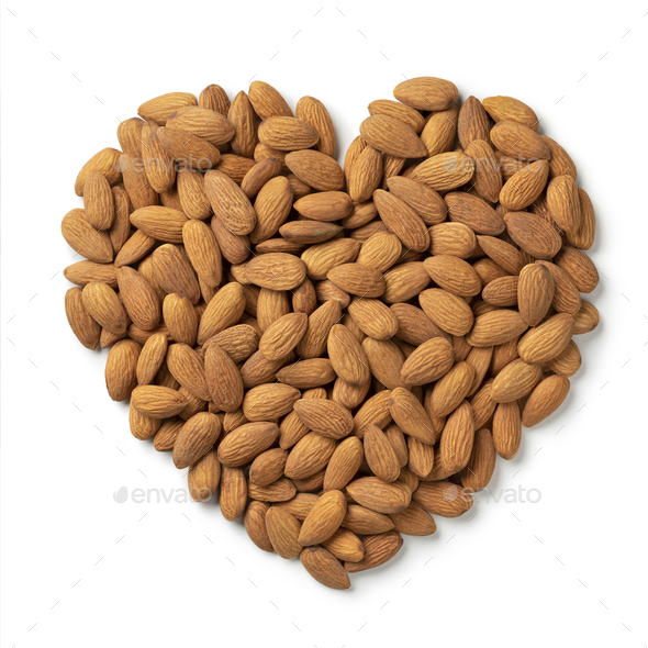Almonds in heart shape isolated on white background - Stock Photo - Images
